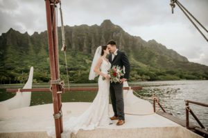 bride and groom photoshoot on a boat