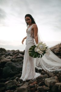 Bride Walking While Holding Flower Bouquet