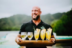 Stir Beverage Owner Holding Cocktails