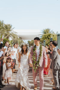 Newly Weds Walking Down the Aisle being celebrated by their family and friends captured by Rachel Kathryn