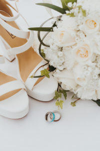 Wedding Rings, Bouquet of White flowers, and bridal shoes by Rachel Kathryn