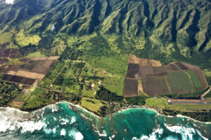 Aerial View of Dillingham Ranch with the Ocean and Mountains of Hawaii